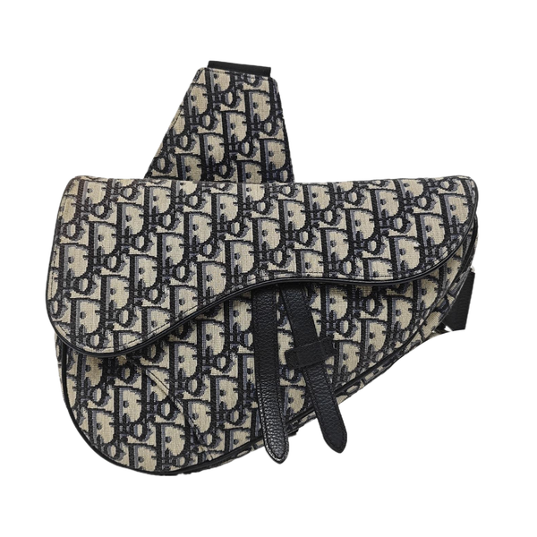 Authenticated pre-owned Saddle Medium Monogram Canvas Beige - Crossbody Bag at Looply