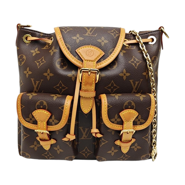 EXCURSION PM Monogram Coated Canvas Brown