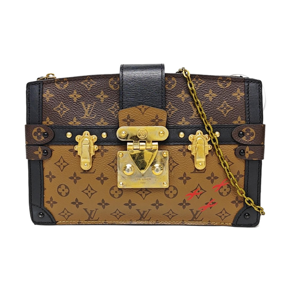 TRUNK Monogram Coated Canvas Brown