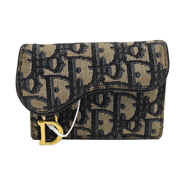 Authenticated pre-owned Saddle Monogram Canvas Blue Card Holder - Card Holder at Looply