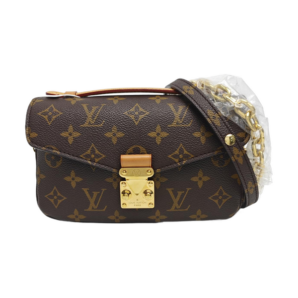 MÉTIS EAST WEST Monogram Coated Canvas Brown