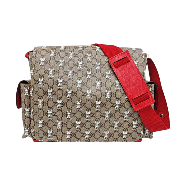 GG Supreme Medium Monogram Coated Canvas Brown