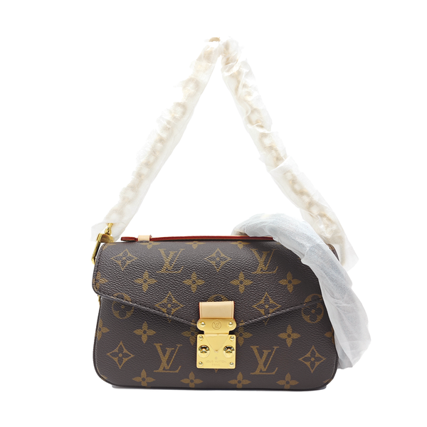 MÉTIS EAST WEST Monogram Coated Canvas Brown