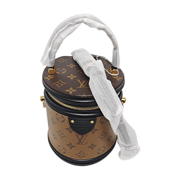 CANNES PM Monogram Coated Canvas Brown