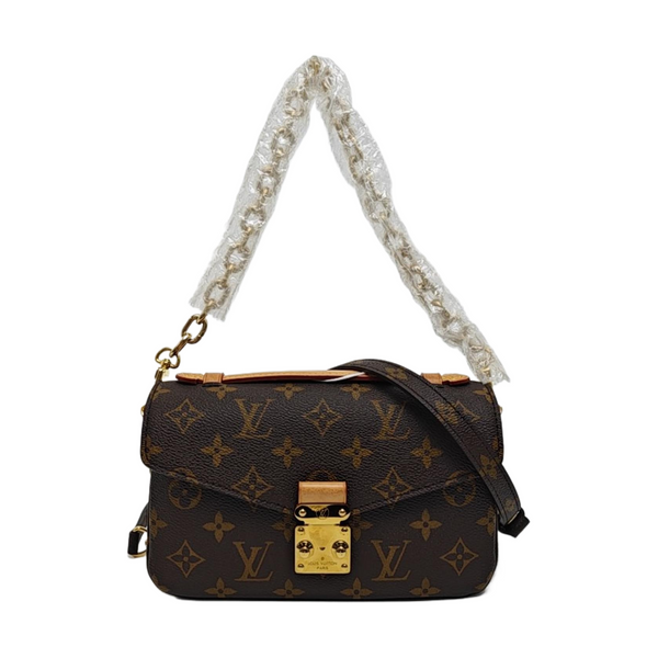 MÉTIS EAST WEST Monogram Coated Canvas Brown