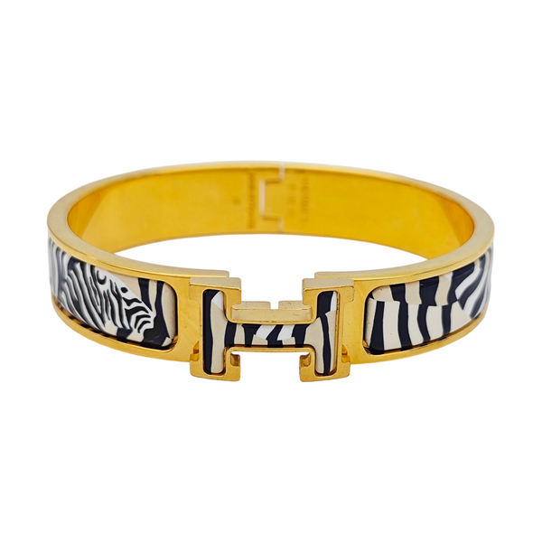 Authenticated pre-owned Clic H Metal Gold Plated Enamel Gold Bracelet - Bracelet at Looply