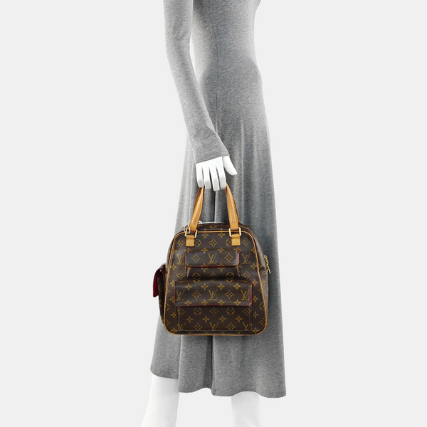 EXCENTRI-CITE Monogram Coated Canvas Brown