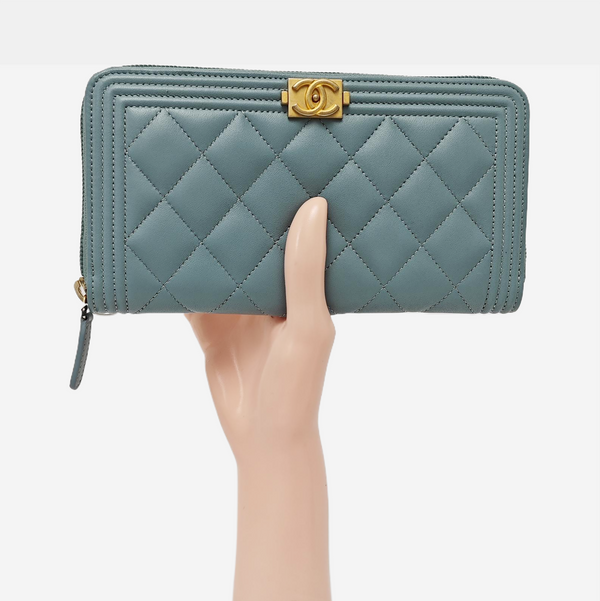 Authenticated pre-owned BOY CHANEL Quilted Lambskin Blue - Clutch at Looply