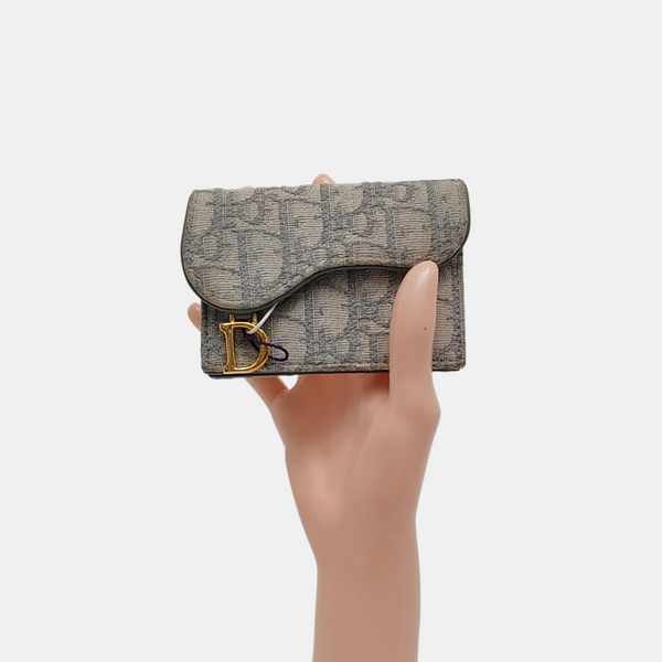 Authenticated pre-owned Saddle Oblique Canvas Gray Wallet - Wallet at Looply