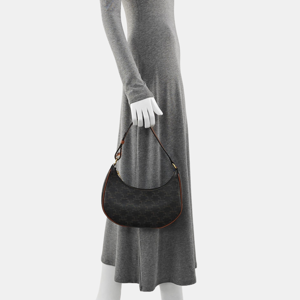 Authenticated pre-owned AVA Coated Canvas Brown - Top Handle Bag at Looply