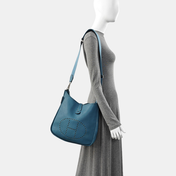 Evelyne GM Clemence Blue
