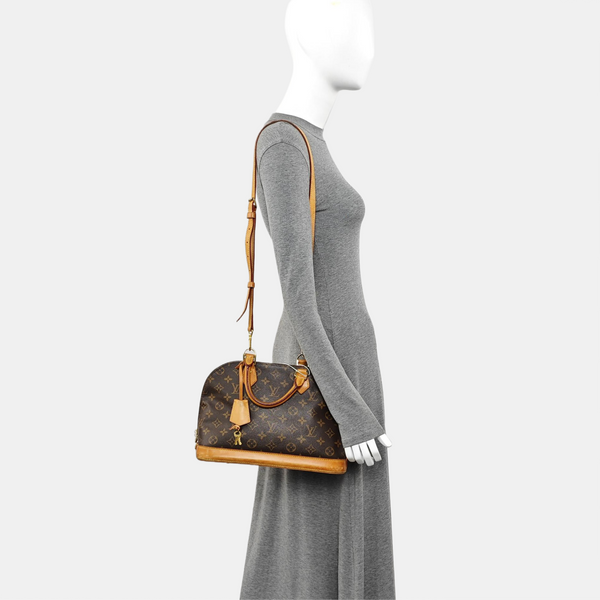 ALMA PM Monogram Coated Canvas Brown