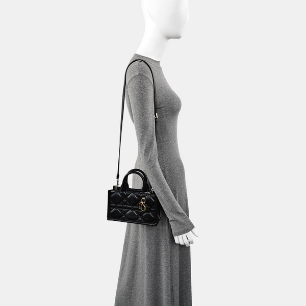 Authenticated pre-owned Lady D-Joy Mini Quilted Calfskin Black - Tote Bag at Looply
