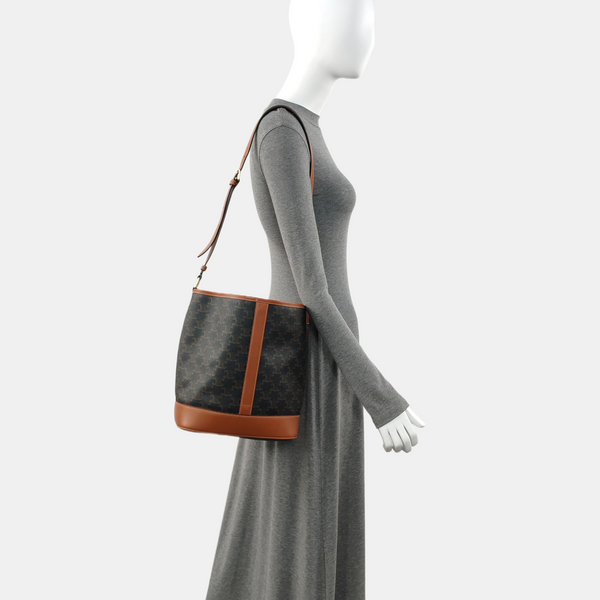 Authenticated pre-owned TRIOMPHE CANVAS Medium Coated Canvas Brown - Bucket Bag at Looply