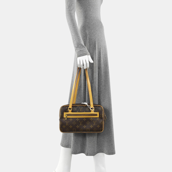 CITE MM Monogram Coated Canvas Brown