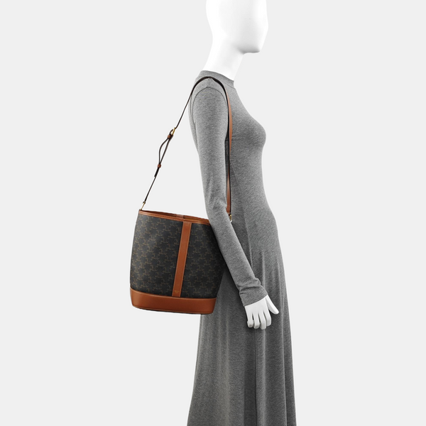 Authenticated pre-owned TRIOMPHE CANVAS Medium Coated Canvas Brown - Bucket Bag at Looply