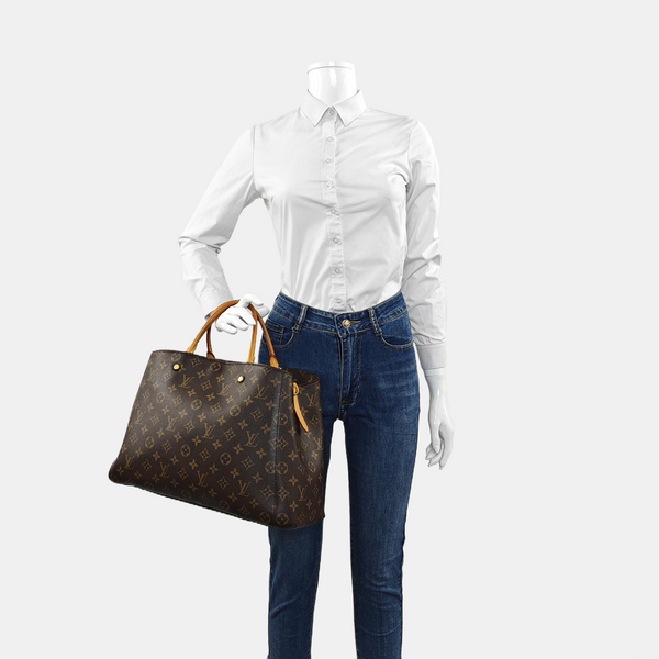 MONTAIGNE GM Monogram Coated Canvas Brown