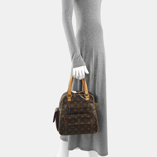 EXCENTRI-CITE Monogram Coated Canvas Brown