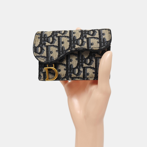 Authenticated pre-owned Saddle Monogram Fabric Blue Card Holder - Card Holder at Looply