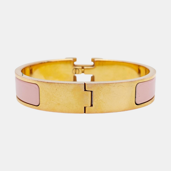 Brazalete Clic H de metal dorado