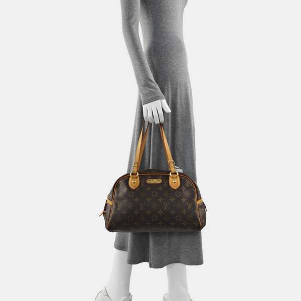 MONTORGUEI PM Monogram Coated Canvas Brown