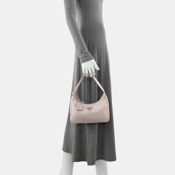 Authenticated pre-owned Re-Edition Nylon Pink - Top Handle Bag at Looply