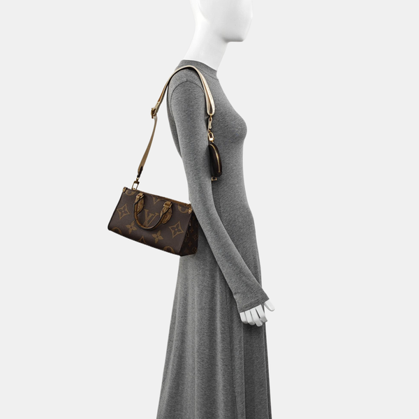ONTHEGO EAST WEST PM Monogram Coated Canvas Brown