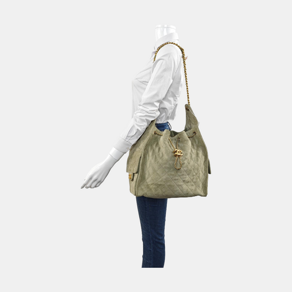Authenticated pre-owned CHANEL 25 Quilted Suede Green - Shoulder Bag at Looply