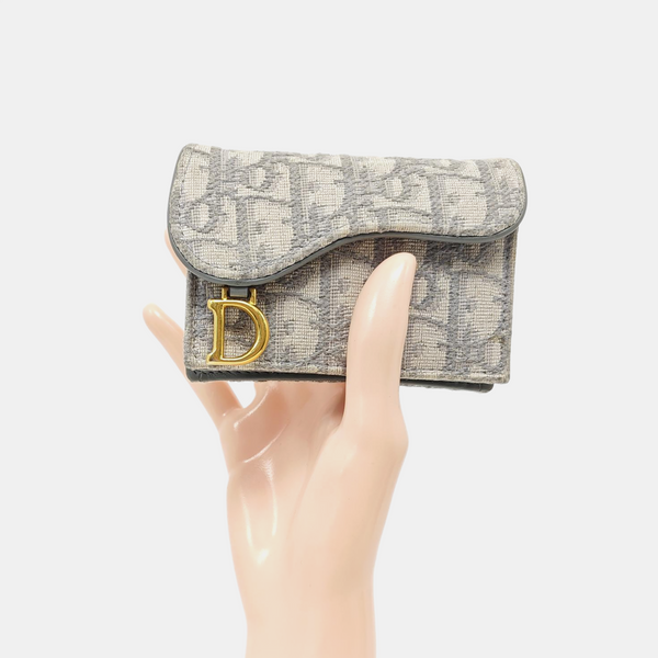 Authenticated pre-owned Saddle Oblique Fabric Gray Card Holder - Card Holder at Looply