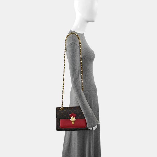 VICTOIRE Monogram Coated Canvas Brown