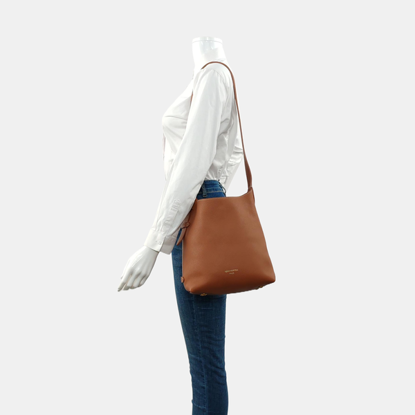 LOW KEY HOBO PM Monogram Calfskin Brown
