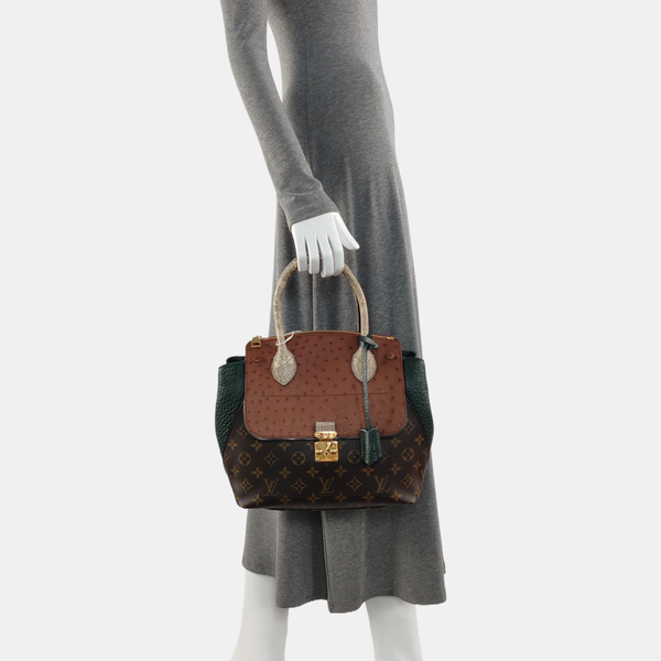 MAJESTUEUX Monogram Coated Canvas Brown