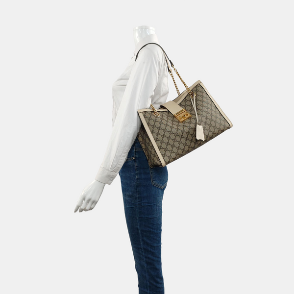 Authenticated pre-owned Padlock Medium Monogram Coated Canvas Beige - Tote Bag at Looply