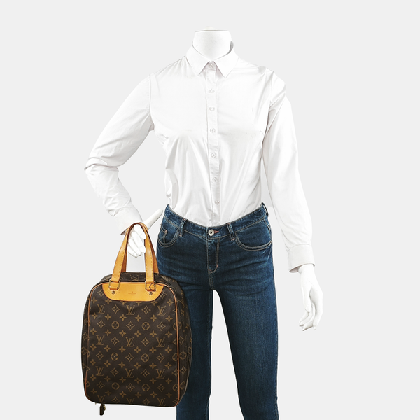 EXCURSION Monogram Coated Canvas Brown