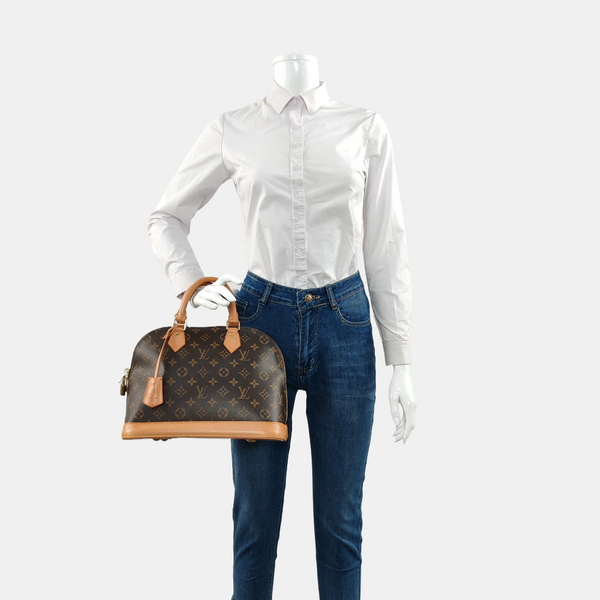 ALMA PM Monogram Coated Canvas Brown