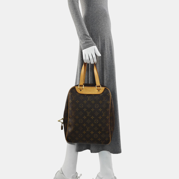 EXCURSION Monogram Coated Canvas Brown