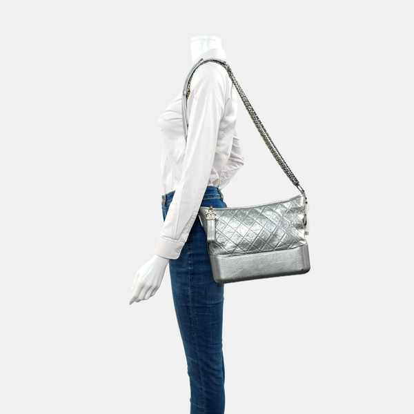 Authenticated pre-owned GABRIELLE Medium Quilted Calfskin Silver - Shoulder Bag at Looply