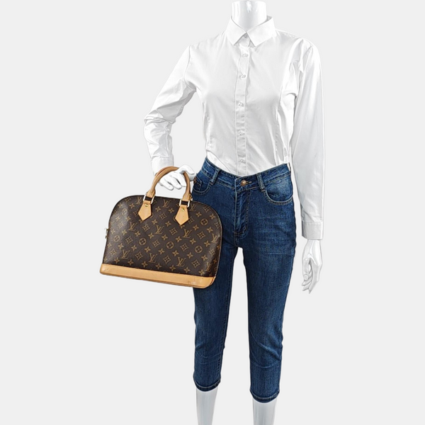 ALMA PM Monogram Coated Canvas Brown