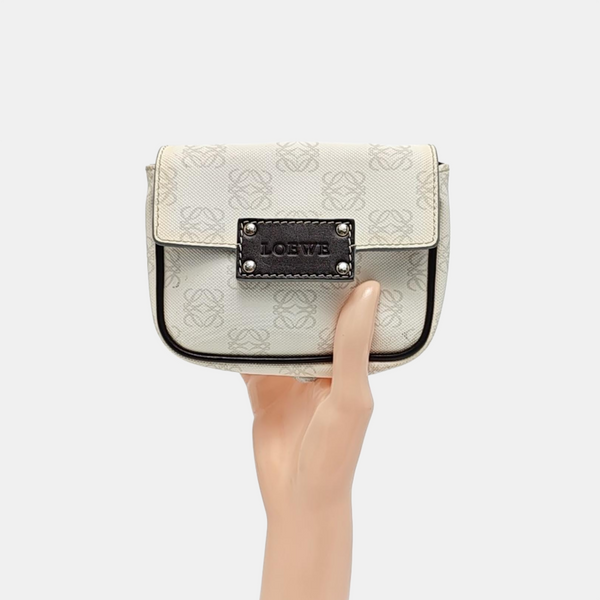 Monogram Coated Canvas Clutch White
