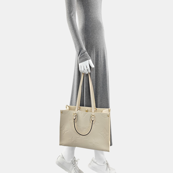ONTHEGO MM Monogram Calfskin Beige