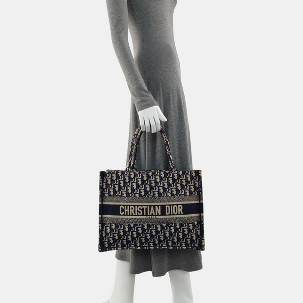 Authenticated pre-owned Book Tote Medium Monogram Canvas Blue - Tote Bag at Looply