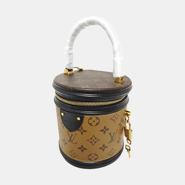 CANNES PM Monogram Coated Canvas Brown