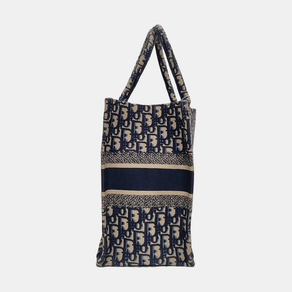 Authenticated pre-owned Book Tote Medium Monogram Canvas Blue - Tote Bag at Looply
