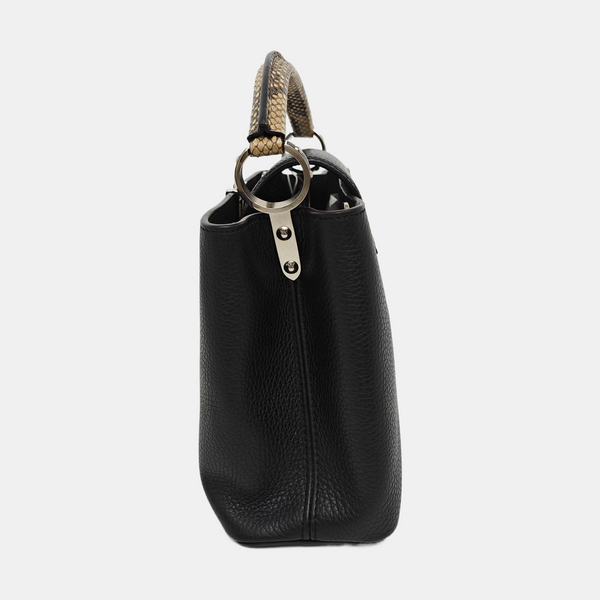 Authenticated pre-owned CAPUCINES Calfskin Black - Top Handle Bag at Looply