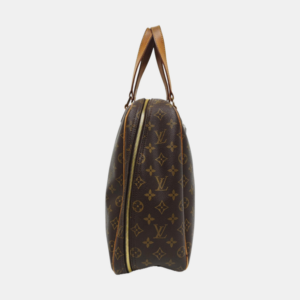EXCURSION Monogram Coated Canvas Brown