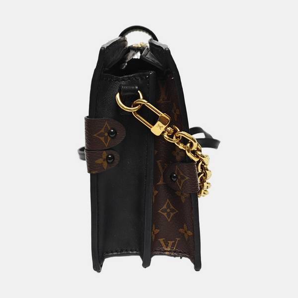 TRUNK Monogram Coated Canvas Brown