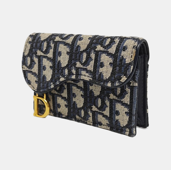 Authenticated pre-owned Saddle Monogram Canvas Blue Card Holder - Card Holder at Looply