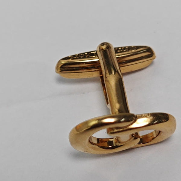 Gemelos de metal dorados