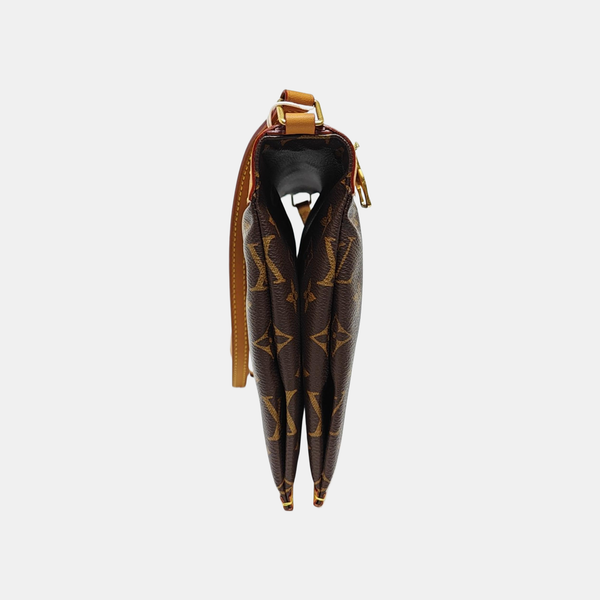 SAUMUR PM Monogram Coated Canvas Brown