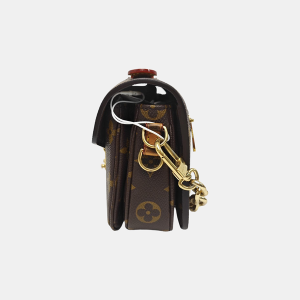 MÉTIS EAST WEST Monogram Coated Canvas Brown